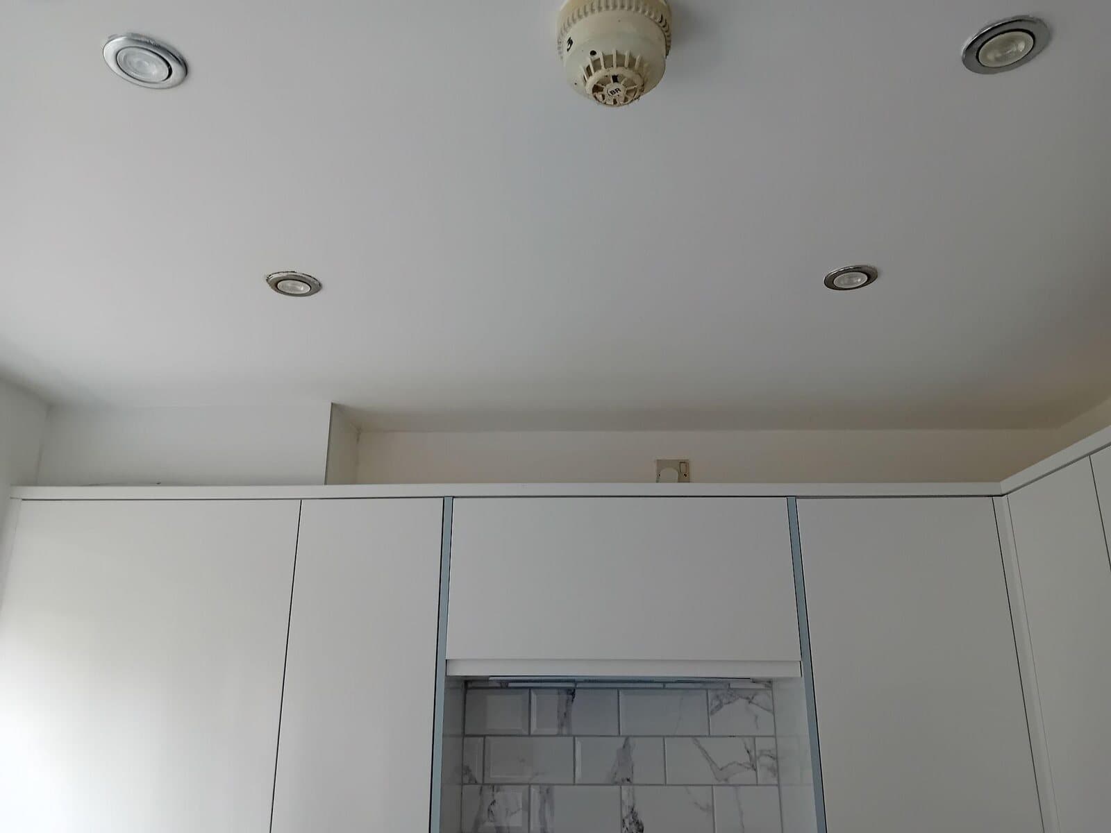 After: kitchen ceiling clean and white above the units